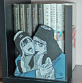 Sujetalibros Baek Nakyum y Yoon Seungho / Pintor nocturno